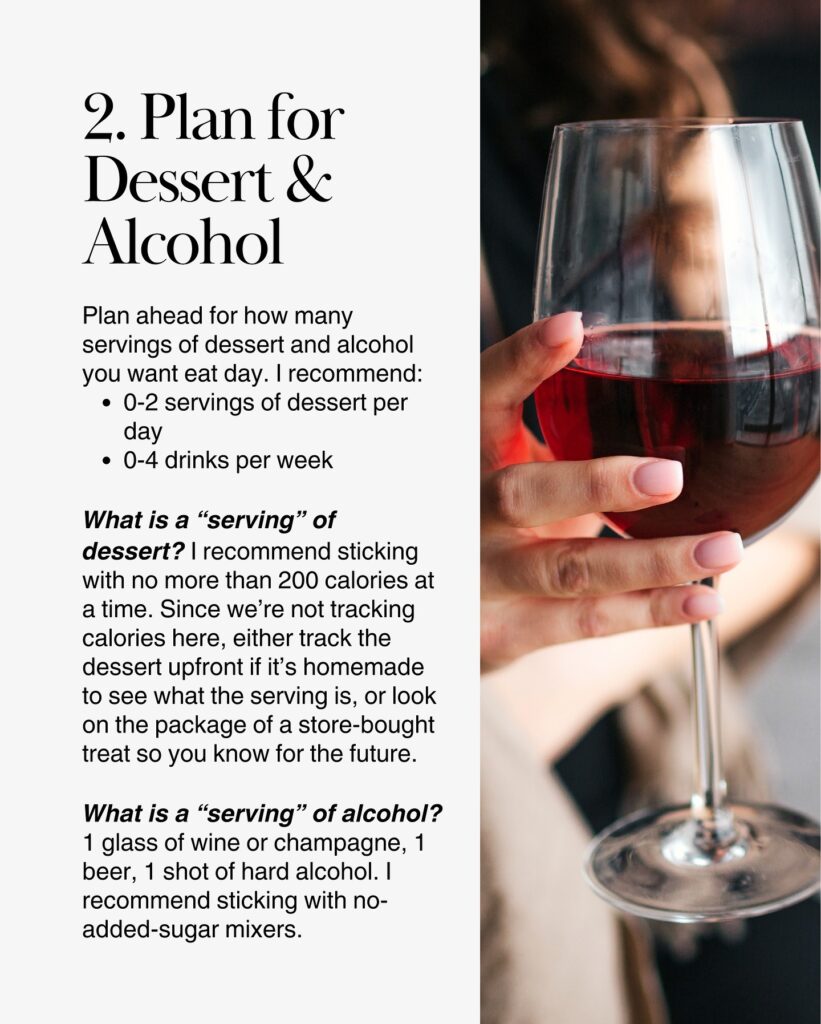 Woman holding a glass of red wine at a table.