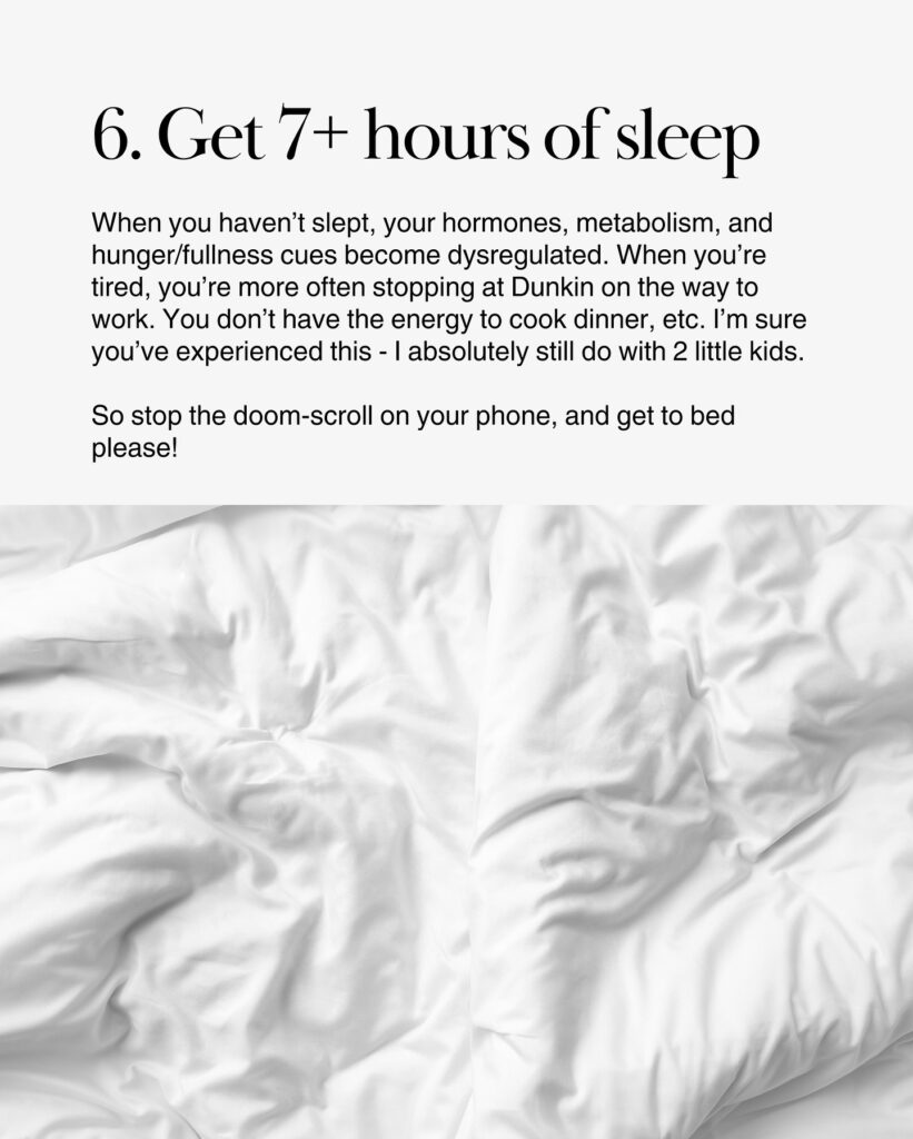 White bed with rumpled blankets.