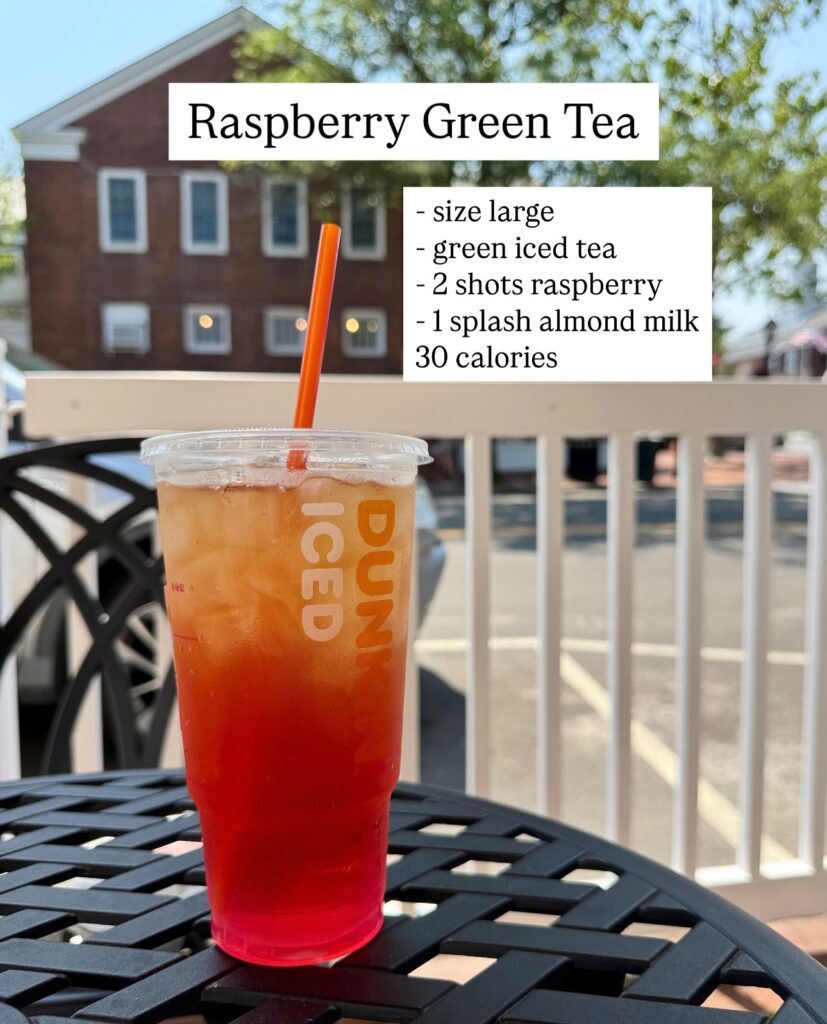 Large Dunkin raspberry green iced tea with almond milk and calorie count displayed.