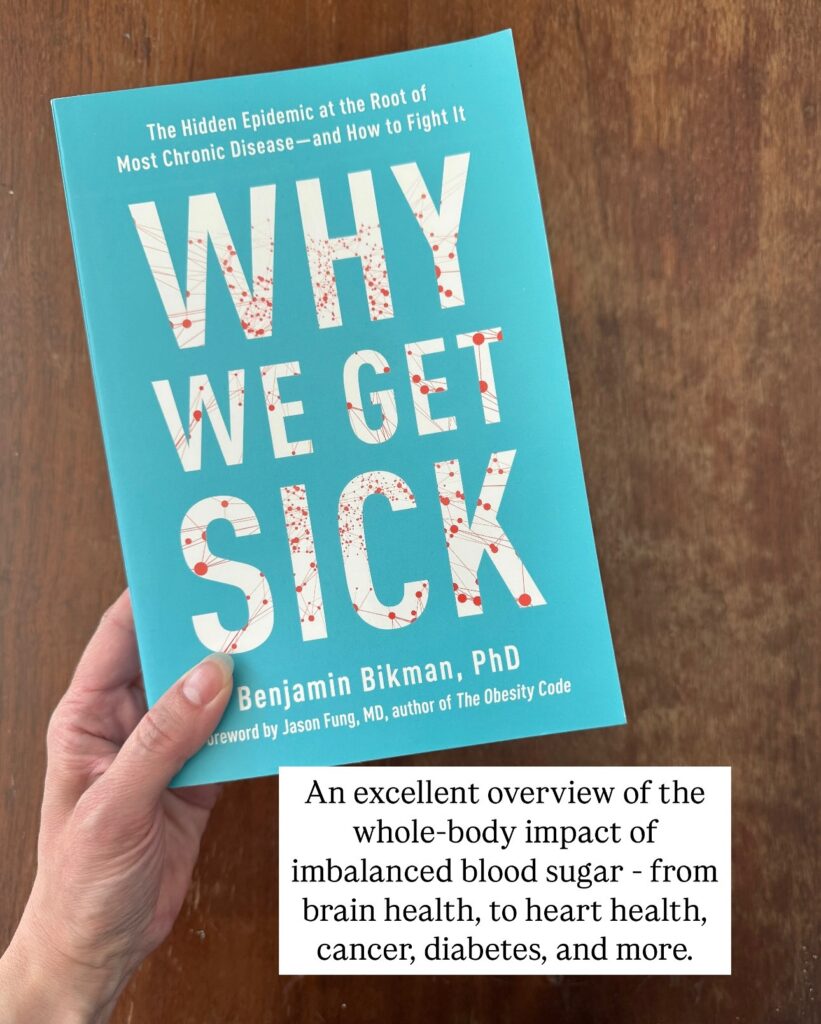 A hand holding "Why We Get Sick: The Hidden Epidemic at the Root of Most Chronic Disease and How to Fight It" by Benjamin Bikman PhD, with a foreword by Jason Fung MD, author of The Obesity Code. The teal book cover features the large title text in white with a red dot network pattern throughout the letters. A text overlay reads "An excellent overview of the whole-body impact of imbalanced blood sugar - from brain health, to heart health, cancer, diabetes, and more."